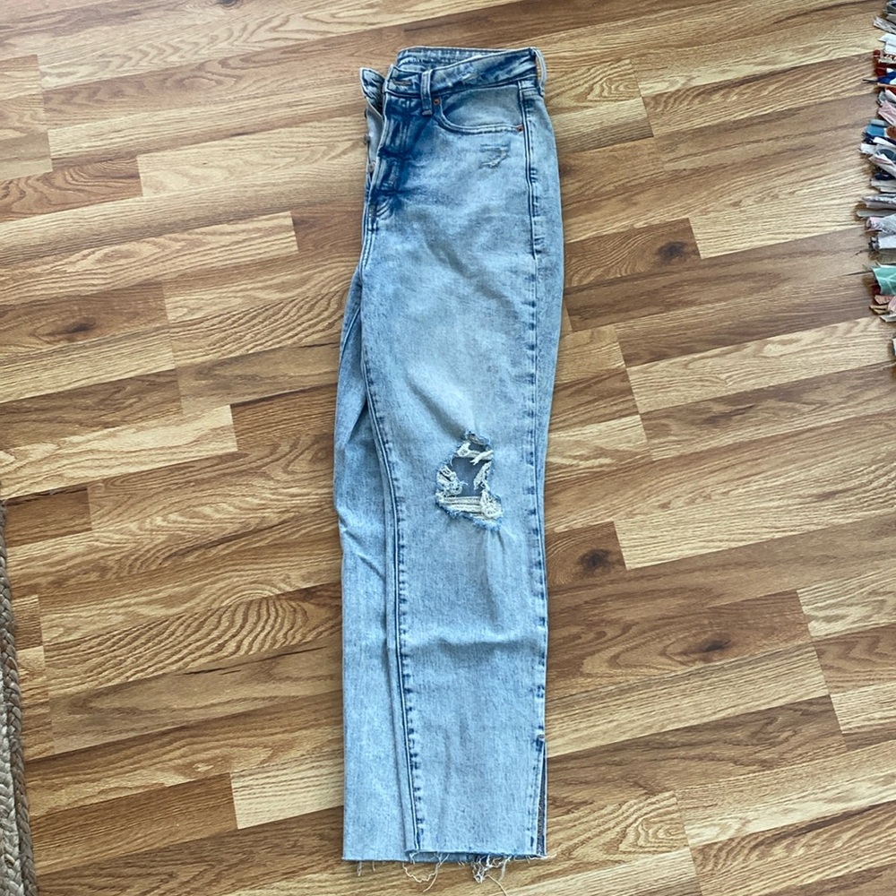 Acid wash ripped jeans